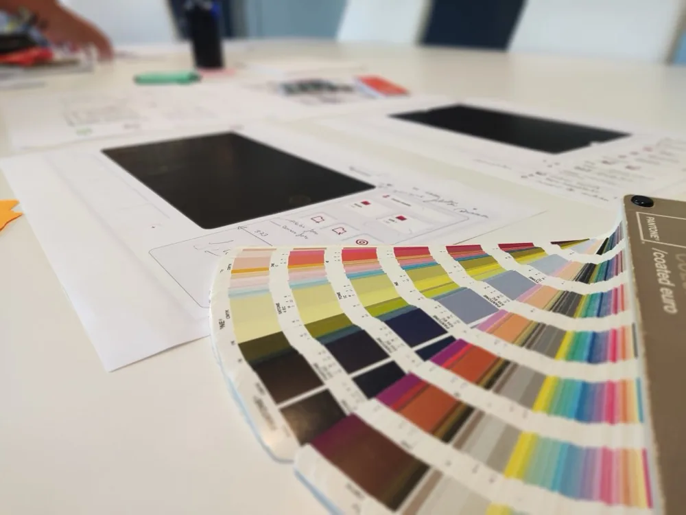 Interface wireframes and color palette.