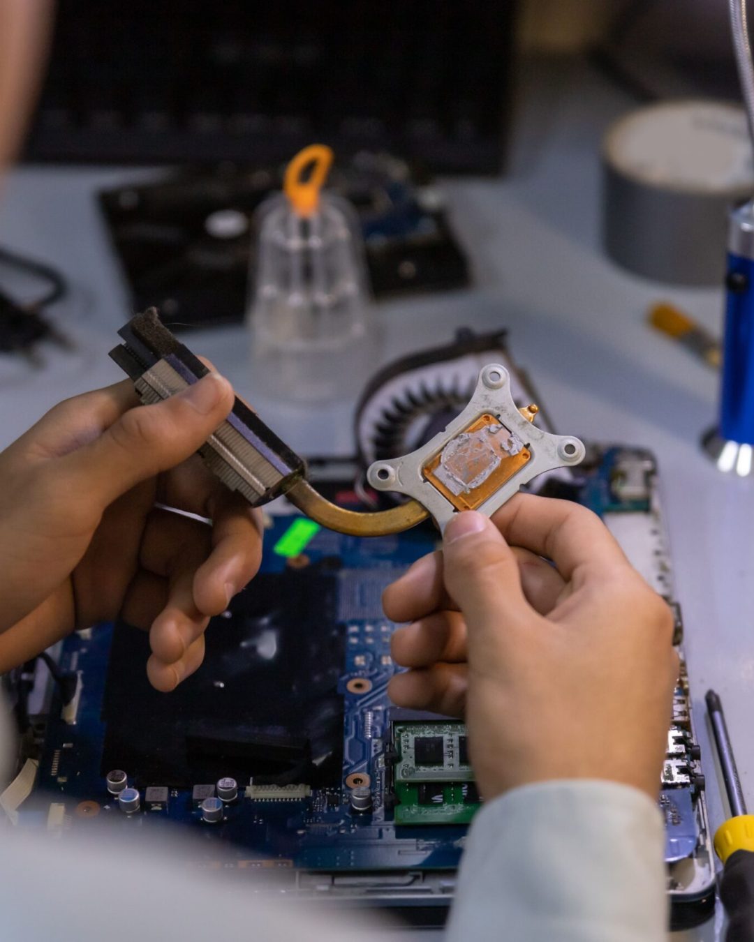 computer-repair-technician-repairing-a-laptop-2025-02-09-02-02-28-utc